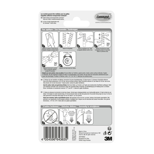 Die Rückseite einer Command™ Edelstahl-Metallhaken Größe S, 17031SS-4ES-Verpackung zeigt eine Schritt-für-Schritt-Anleitung (bebildert und in mehreren Sprachen) mit Produktinformation. Die Logos von 3M und Command erscheinen oben rechts. Enthält 4 Haken, 5 Strips.