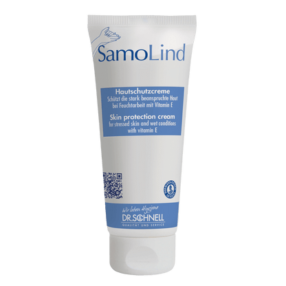 Bílá tuba Dr. Schnell SAMOLIND ochrana pokožky od DR.SCHNELL GmbH & Co. KGaA s modrými akcenty a německo/anglickým textem. Krém chrání namáhanou pokožku při vlhkosti a obsahuje vitamín E.
