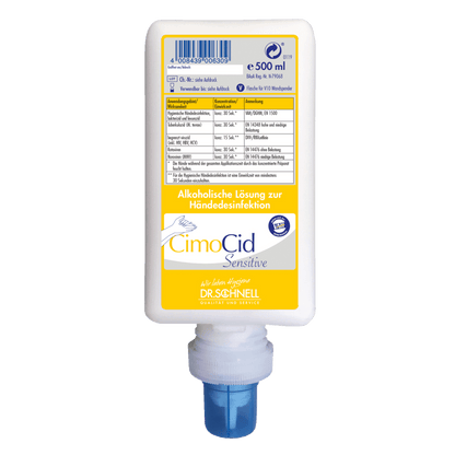Bílá láhev 500 ml Dr. Schnell CIMOCID SENSITIVE dezinfekce na ruce od DR.SCHNELL GmbH & Co. KGaA, s modrým uzávěrem a žluto-modrou etiketou v německém jazyce. Jemná k pokožce, vhodná pro účinné snížení počtu bakterií.