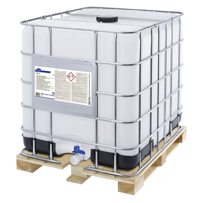 Velká bílá IBC nádrž Diversey Suma Alu L10 od Diversey Deutschland GmbH & Co. OHG, s kovovou klecí, dřevěným paletovým dnem, varovným upozorněním a informačním listem na přední straně a modrým výpustným otvorem dole.