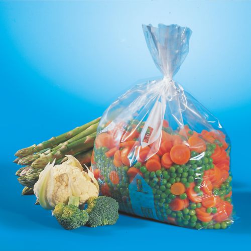 Ein transparenter Starpak 45 Gefrierbeutel (LLDPE, 6 l, 46 x 30 cm), gefüllt mit geschnittenen Karotten und grünen Erbsen, wird neben frischem Spargel, Blumenkohl und Brokkoli präsentiert – ideal für die Lagerung im Gefrierschrank. Faltschachtel (45 Stück).