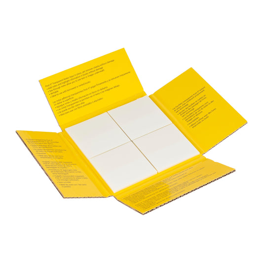 Eine geöffnete gelbe Kartonpackung Post-it® Transparent Notes (73 mm x 73 mm, 12 Blöcke/Packung) der 3M Deutschland GmbH offenbart vier weiße rechteckige Blöcke und sichtbare gedruckte Anweisungen auf den Innenlaschen.