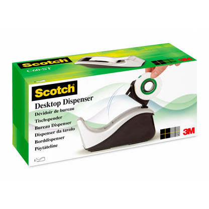 Ein Karton für den Scotch™ Klebeband-Abroller C60 + Scotch® Magic™ Unsichtbares Klebeband (19 mm x 33 mm) der 3M Deutschland GmbH zeigt eine Hand, die das Klebeband in den weiß-grauen Abroller einlegt, mit mehrsprachiger Beschriftung und einem 3M-Logo in der Ecke.