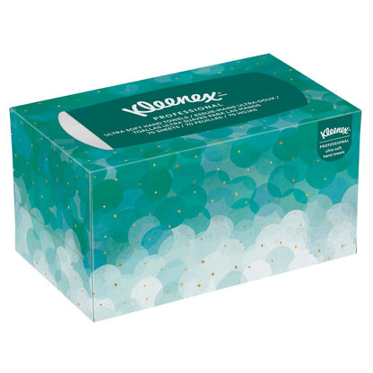 Kleenex® Ultra™ ručníky Interfold (70 kusů, bílá, střední) od Kimberly-Clark GmbH přicházejí v obdélníkové krabici s abstraktním designem v tyrkysově/modré a zlatými akcenty, která má bílý otvor pro kapesníky - ideální pro hygienické ruce v profesionálním prostředí.