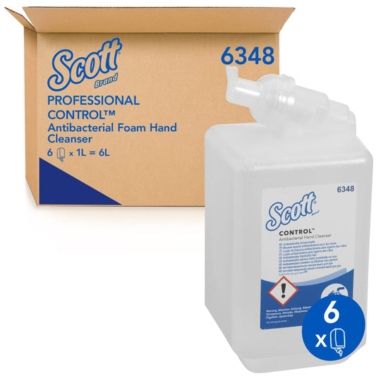 Das Bild zeigt eine Kimberly-Clark GmbH Scott® Anti Bac Foam Soap 1L Kassette vor einer Schachtel mit der Aufschrift "6 x 1L = 6L". Ein blaues Symbol hebt die 6er-Packung (Kartuschen) hervor - perfekt für Waschräume.
