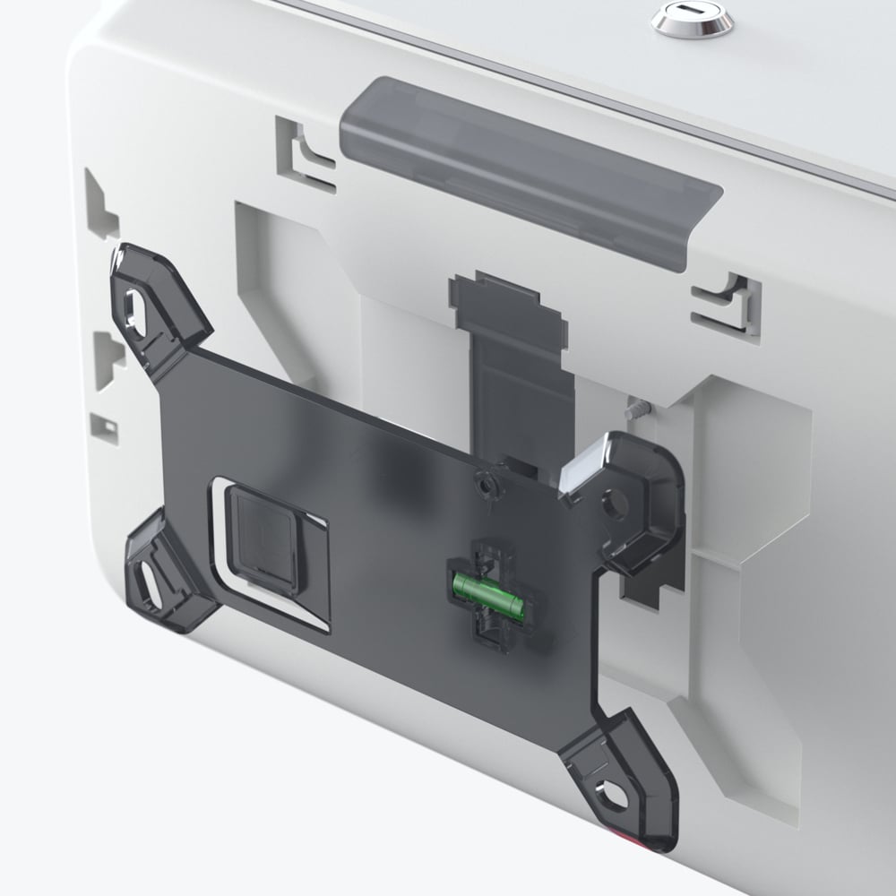 Nahaufnahme der Rückseite eines Kimberly-Clark Professional™ Icon™ Toilettenpapierspenders - Kleinrollen von Kimberly-Clark GmbH, die die schwarze Halterung und die sichtbaren internen Komponenten einschließlich eines grünen Steckers zeigt.