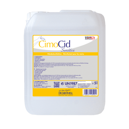 Bílá 5L plastová nádoba Dr. Schnell CIMOCID SENSITIVE dezinfekce na ruce od DR.SCHNELL GmbH & Co. KGaA se žlutou etiketou nabízí jemnou ochranu pokožky a účinné snížení počtu bakterií s vícejazyčnými pokyny pro použití a bezpečnost.