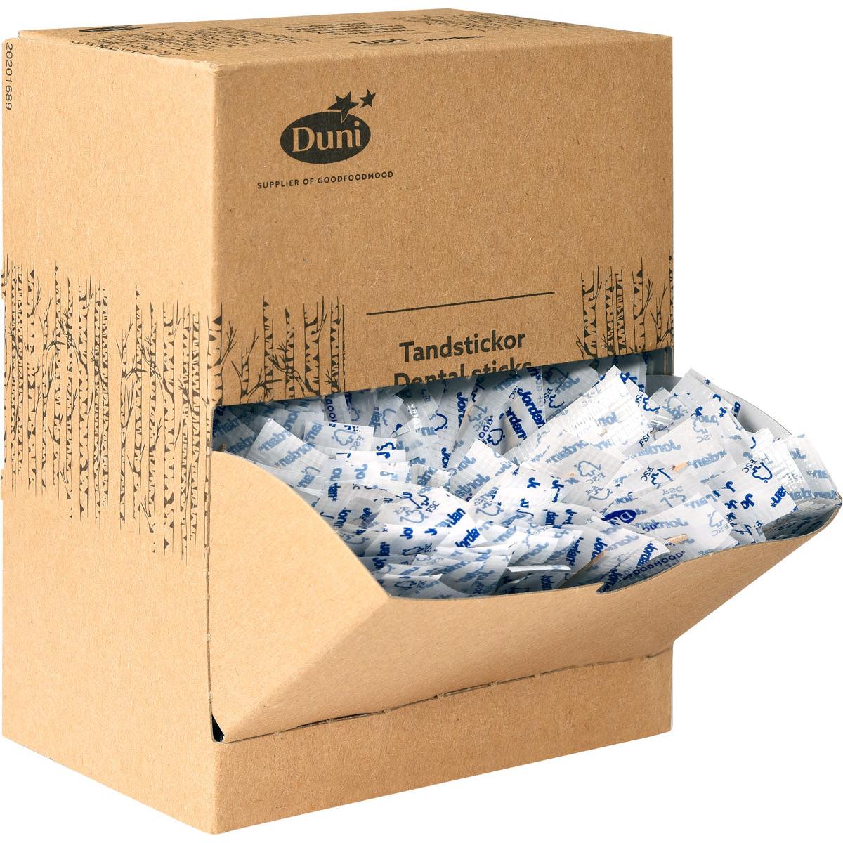 Hnědá dárková krabice z lepenky s nápisem "Duni GmbH Zahnstocher Neutral Holz 50 | Packung (1000 Stück)" obsahuje jednotlivě balené dřevěné párátka v bílém a modrém obalu, z nichž některé jsou viditelné skrz otevřenou přední klapku.