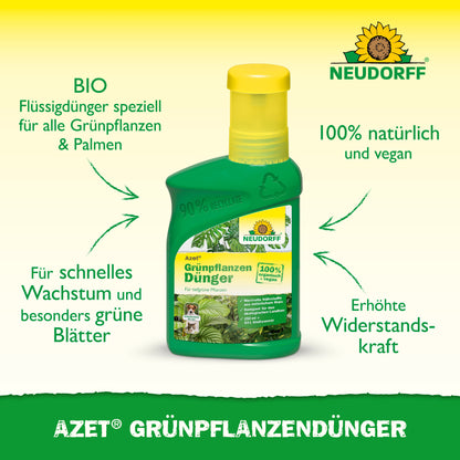 Eine grüne Flasche Neudorff Shop Azet GrünpflanzenDünger flüssig mit einer gelben Kappe, auf der ein deutscher Text über die organischen Nährstoffe für Zimmerpflanzen steht, die ein schnelles Wachstum, leuchtend grüne Blätter und eine stärkere Widerstandskraft fördern.