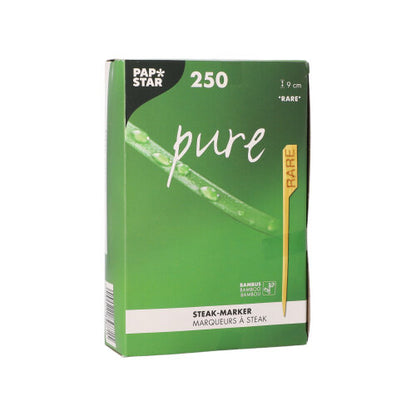 Steaková značka PAPSTAR 250 9 cm od PAPSTAR GmbH je dodávána v zeleno-bílé krabici. Balení obsahuje žlutou značku "RARE" a grafiky listů a kapek vody, které jsou navrženy pro profesionální kuchyně v restauracích.