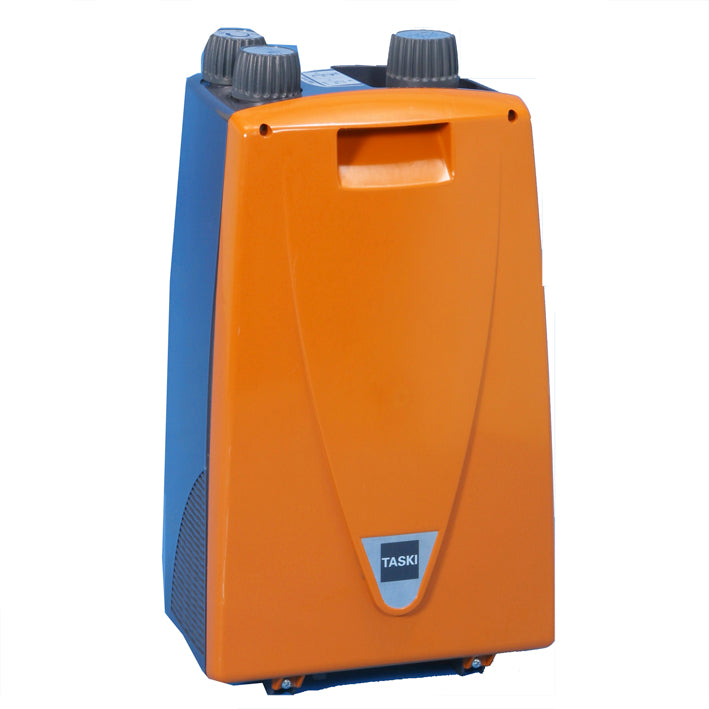 Vztyčené, obdélníkové zařízení na výrobu pěny 230 V (od Diversey Deutschland GmbH & Co. OHG) pro TASKI ergodisc 165/duo; oranžové a modré se dvěma šedými ovládacími knoflíky nahoře, přední rukojetí a malým štítkem "Taski" blízko spodní části.