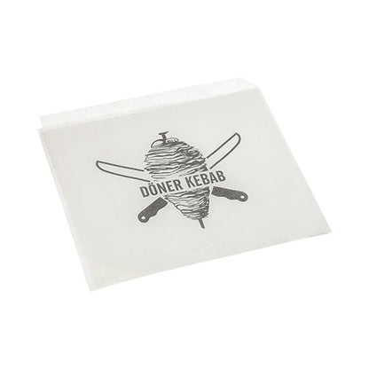Tašky na kebab PAPSTAR, náhrada pergamenu, 16x16 cm, tukuvzdorná smrštitelná fólie (1000 kusů) od PAPSTAR GmbH je odolný, bílý obal na potraviny s kebabovým špízem a zkříženými noži a textem "DÖNER KEBAB".