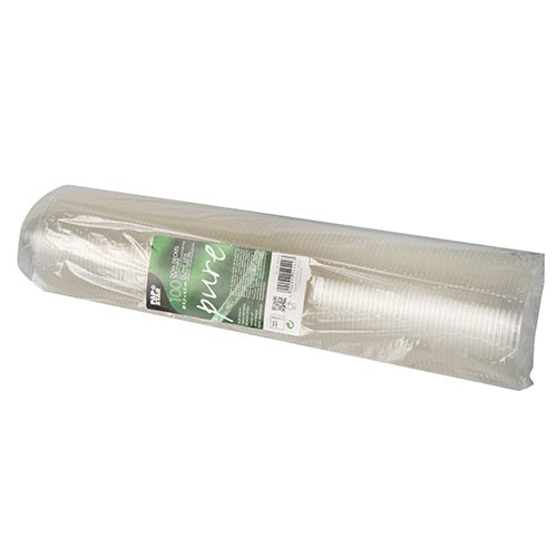 Srolovaný stoh průhledných PAPSTAR 100 Dom krytů, PLA „pure“ kulaté kryty (Ø 9,5 cm, 4,5 cm), od PAPSTAR GmbH, zabalený v průhledném obalu se zeleno-bílou etiketou s informacemi o produktu.