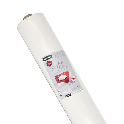 Zobrazená je velká role ubrusu Starpak, podobného látce, netkaná textilie „soft selection“ (25 m x 1,18 m, bílá) s etiketou se symbolem polštáře a detaily produktu, vyfocená před jednoduchým bílým pozadím.