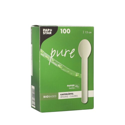 Bílá krabice s nápisem "PAPSTAR papírová lžička na kávu 'pure' 13 cm, bílá, ekologická" od PAPSTAR GmbH obsahuje 100 ekologických papírových lžiček na kávu s délkou 13 cm; obal je opatřen obrázkem lžičky a informací o biologickém původu.