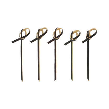 Pět PAPSTAR 250 Fingerfood - Picker od PAPSTAR GmbH v černé barvě se světle hnědými smyčkovými akcenty na vrcholu, uspořádané v řadě na bílém pozadí.