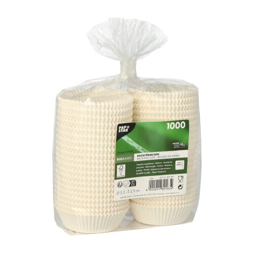 V průhledném plastovém sáčku se nachází 1 000 PAPSTAR 1000 kulatých pečicích košíčků od PAPSTAR GmbH, se zelenou etiketou s podrobnostmi o produktu a certifikacemi.