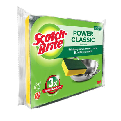 Zobrazeno je balení čisticí houbičky 3M Deutschland GmbH Scotch-Brite® Classic se dvěma houbičkami. Na převážně zeleném obalu je zobrazená houbička a kovový hrnec, spolu s anglickým a německým textem.