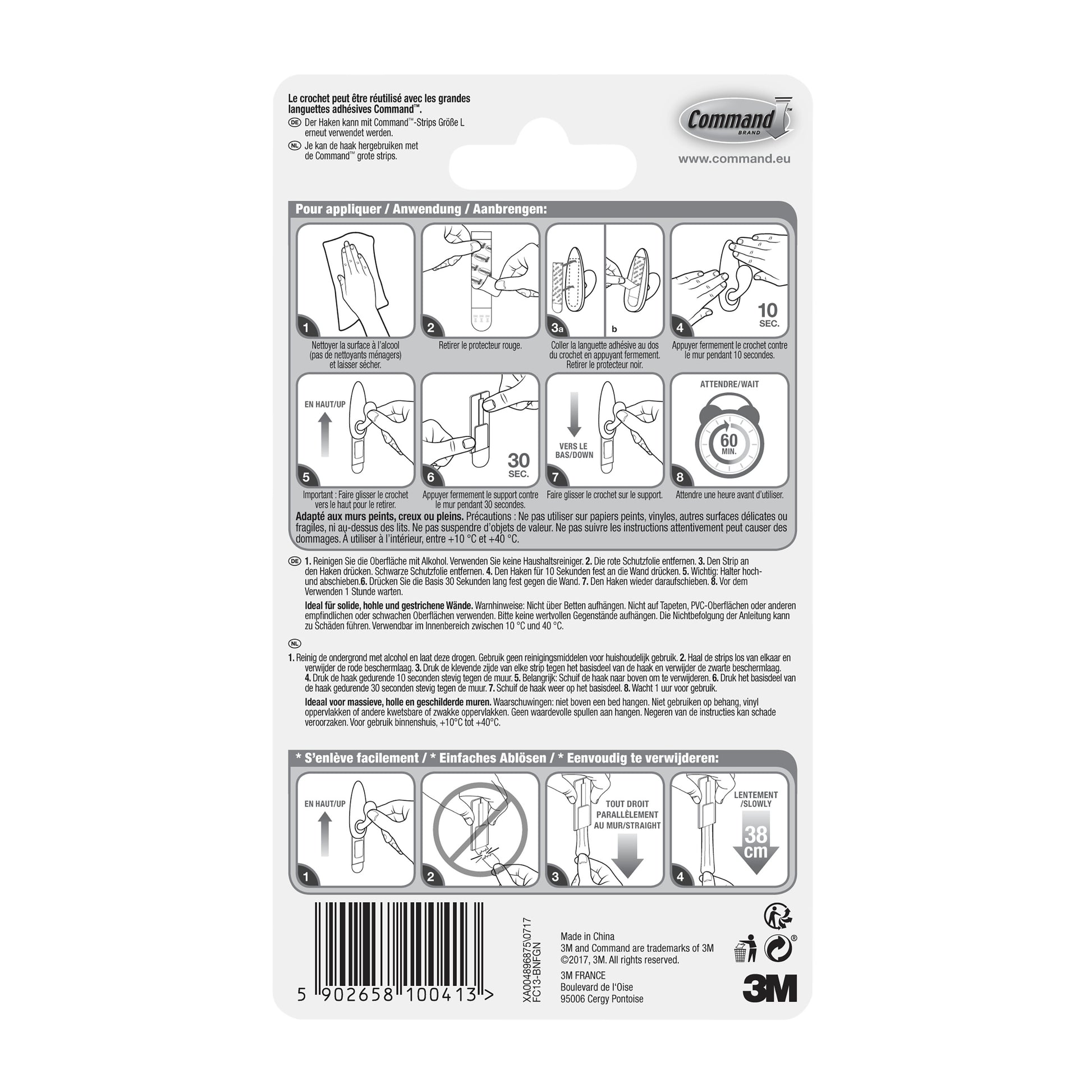 Rückseite der Command™ Metallhaken "klassisch" (3M Deutschland GmbH) Verpackung mit bebilderter Schritt-für-Schritt-Anleitung in mehreren Sprachen zur korrekten Anwendung und Entfernung sowie Warnhinweisen und Produktinformationen am unteren Rand.