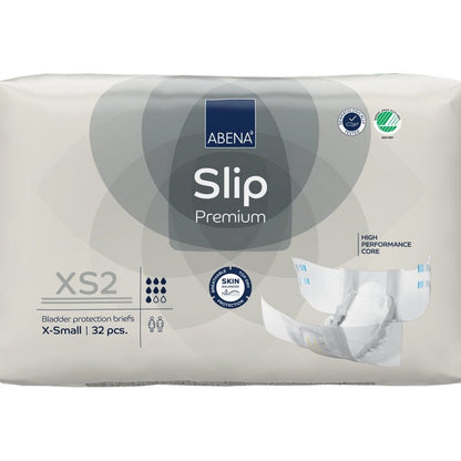 Balení 32 kusů ABENA Slip Premium od Abena Re-Seller GmbH ve velikosti XS2 X-Small v béžovém balení s certifikacemi "High Performance Core" a "Skin Friendly" pro spolehlivou inkontinenční péči.