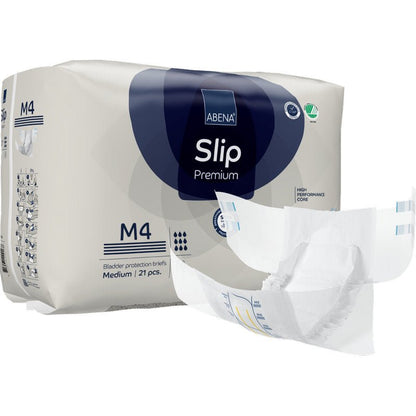 Zobrazeno je balení ABENA Slip Premium od Abena Re-Seller GmbH s nerozloženým slipem v popředí. Balení obsahuje 21 středně velkých slipů pro spolehlivou inkontinenční péči.