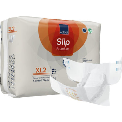 ABENA Slip Premium od společnosti Abena Re-Seller GmbH, velikost XL2, nabízí spolehlivou inkontinenční ochranu s výkonným jádrem. Balení obsahuje 21 kusů, přičemž jedna nerozložená plena je zobrazena na přední straně.