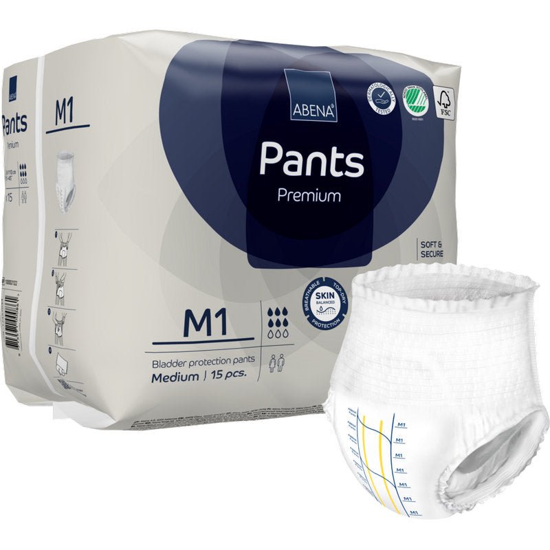 Balení ABENA Pants Premium M od Abena Re-Seller GmbH obsahuje 15 středně velkých jednorázových kalhotek, z nichž každá je zobrazena mimo obal pro spolehlivou ochranu močového měchýře.
