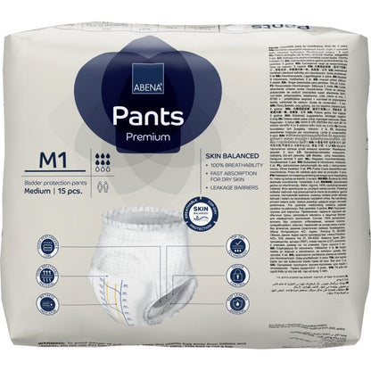 Balení ABENA Pants Premium M od Abena Re-Seller GmbH, střední velikost, obsahuje 15 kusů. Obal obsahuje symboly a texty pro vysokou savost, prodyšnost, absorpci a rovnováhu pokožky.