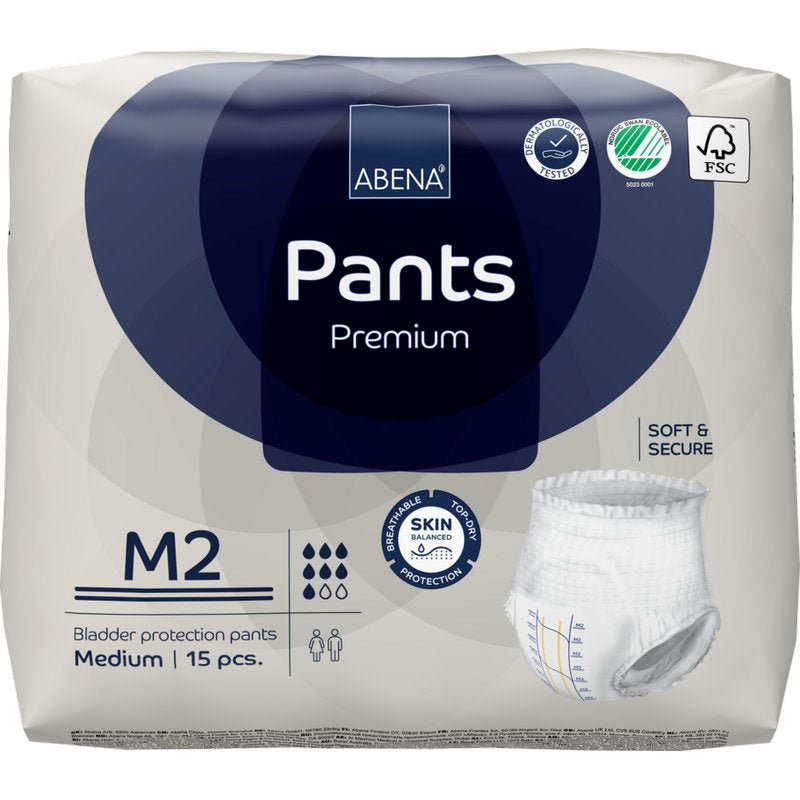 Balení 15 ks ABENA Pants Premium M od Abena Re-Seller GmbH. Bílo-modrý obal zobrazuje ikony pro vysokou savost, ochranu pokožky, savost a ekologickou certifikaci.