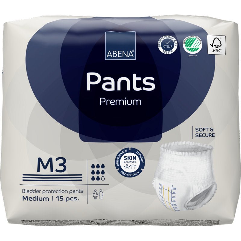 Balení ABENA Pants Premium M od Abena Re-Seller GmbH, střední velikost, 15 kusů. Obal zdůrazňuje ochranu pokožky, měkkost, bezpečnost a ekologickou certifikaci. Obsahuje obrázek jednorázových kalhotek.