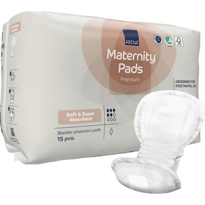Balení ABENA Maternity Pad, Premium (15 kusů) od Abena Re-Seller GmbH nabízí měkké, super savé vložky, které byly vyvinuty pro použití po porodu - ideální poporodní vložky pro maximální pohodlí po porodu, s otevřenou vložkou zobrazenou vpředu.