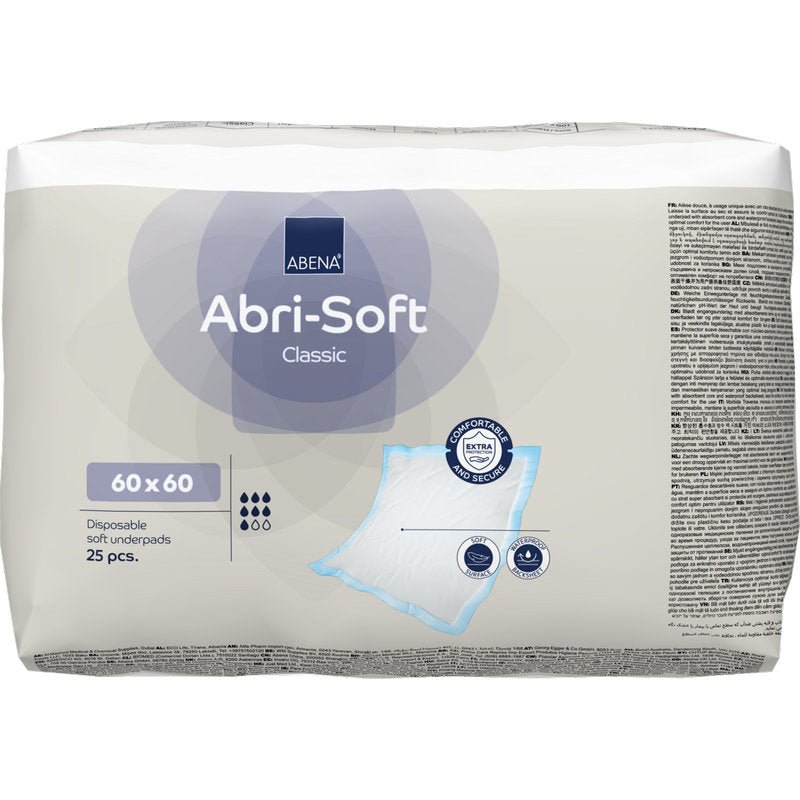 Balení s 25 jednorázovými podložkami Abena Re-Seller GmbH Abri-Soft Classic, 60x60 cm, modrá. Obal zobrazuje detaily produktu, obrázek podložky a certifikační symboly.