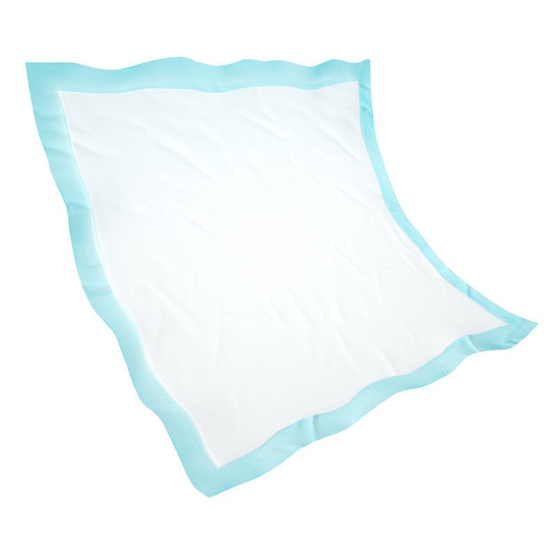 Čtvercová bílá jednorázová podložka Abena Re-Seller GmbH, Abri-Soft Classic (60x60 cm, modrá), se světle modrým okrajem a zvlněnými hranami, leží naplocho na jednobarevném bílém pozadí. Balení obsahuje 25 kusů.
