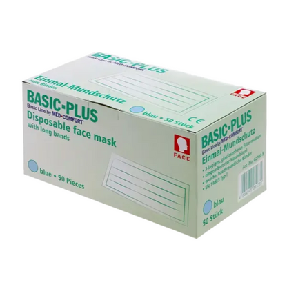 Bílá krabička „AMPri BASIC-PLUS OP Maske 3-lg. Typ II zum Binden“ od společnosti AMPri Handelsgesellschaft mbH, která obsahuje 50 kusů s dlouhými pásky. Krabička obsahuje text v angličtině a němčině a na straně obrázek modré obličejové masky.