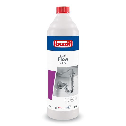 1litrová láhev tekutého čističe potrubí Buzil Buz® Flow G 577, vyrobená společností BUZIL-WERK Wagner GmbH & Co. KG. Na etiketě je vyobrazena sanitární grafika a logo produktu. Převážně bílá láhev je doplněna červenými, modrými a fialovými detaily a opatřena červeným uzávěrem, který slouží k účinnému odstranění ucpání v odtokových trubkách.