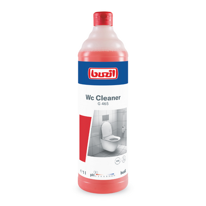 Láhev Buzil WC Cleaner G 465 Viskózní sanitární základní čistič, vyrobená společností BUZIL-WERK Wagner GmbH & Co. KG, je navržena pro efektivní odstranění vodního kamene a močových usazenin. Červená láhev má zářivě modro-bílou etiketu s obrázkem toalety a názvem a textem produktu a je uzavřena odpovídajícím červeným víčkem.