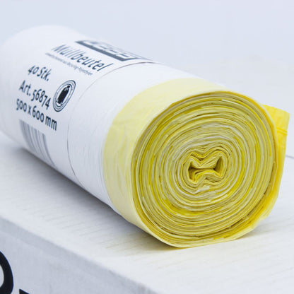 Srolované balení DEISS odpadkových pytlů 56874 o objemu 30 litrů se stahovací šňůrkou od EMIL DEISS KG (GmbH + Co.), se žlutými a bílými plastovými pytli na bílém pozadí. Etiketa na roli uvádí rozměry 500 x 600 mm a informuje, že obsahuje 40 kusů s objemem 30 litrů každý.