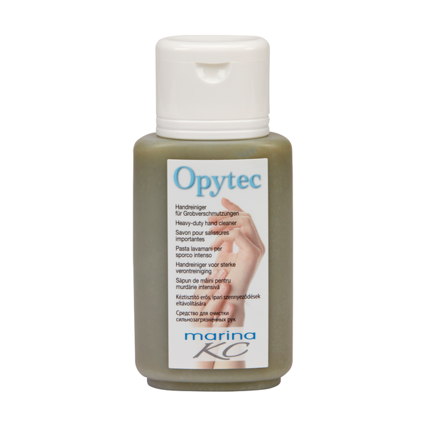 Plastová láhev od Johannes Kiehl KG s bílým víčkem a nápisem Kiehl Opytec čistič na ruce pro hrubé nečistoty" nese vícejazyčnou etiketu marina KC" na světlém pozadí.