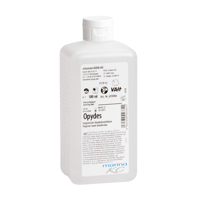 Bílá 500ml plastová láhev Kiehl Opydes Hygienische Händedesinfektion od společnosti Johannes Kiehl KG s bílým uzávěrem a etiketou s pokyny k použití, dávkováním, informacemi o výrobci a certifikačními logy.