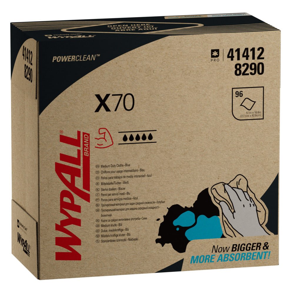 Karton Kimberly-Clark GmbH WypAll® X70 PowerClean Zupfbox/Modrá (10 kartonů x 100 listů) ukazuje produktové informace, modro-černou ilustraci ruky a text "Now BIGGER & MORE ABSORBENT!" pro profesionální úklid.