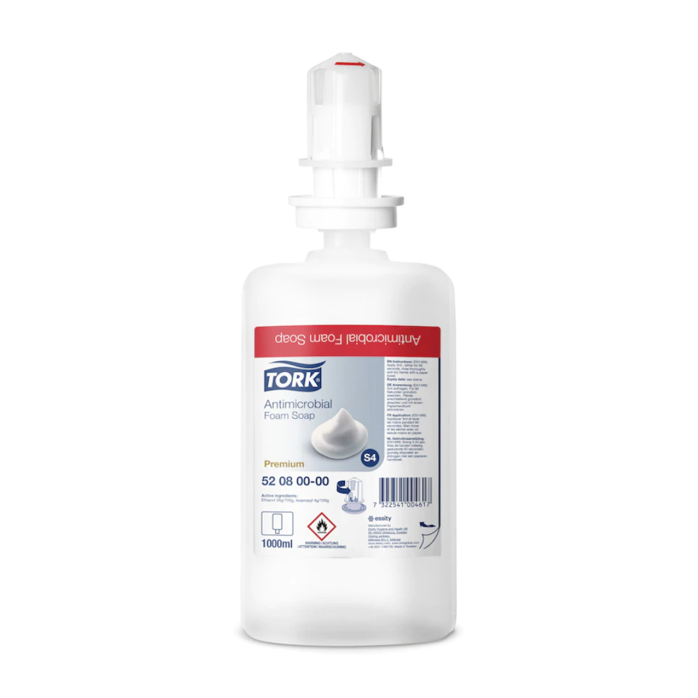 1000 ml Tork 520800 pěnové mýdlo pro dekontaminaci rukou Premium S4 láhev od TORK - Essity Professional Hygiene Germany GmbH, s bílou dávkovací hlavicí a červeným štítkem. Certifikováno podle EN 1499, ideální pro efektivní dekontaminaci rukou.
