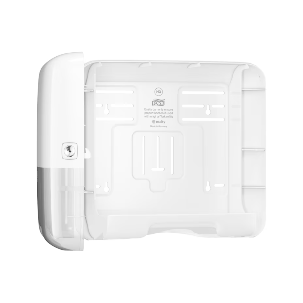 Mini dávkovač Tork 553100 pro skládané ručníky má elegantní design Elevation a zámek na levé straně. Díky otevřené čelní desce máte přístup k montážním drážkám a uvnitř můžete najít pokyny. Díky tomu je ideální pro kompatibilitu se skládanými ručníky. Tento produkt je poskytován společností TORK, součástí Essity Professional Hygiene Germany GmbH.