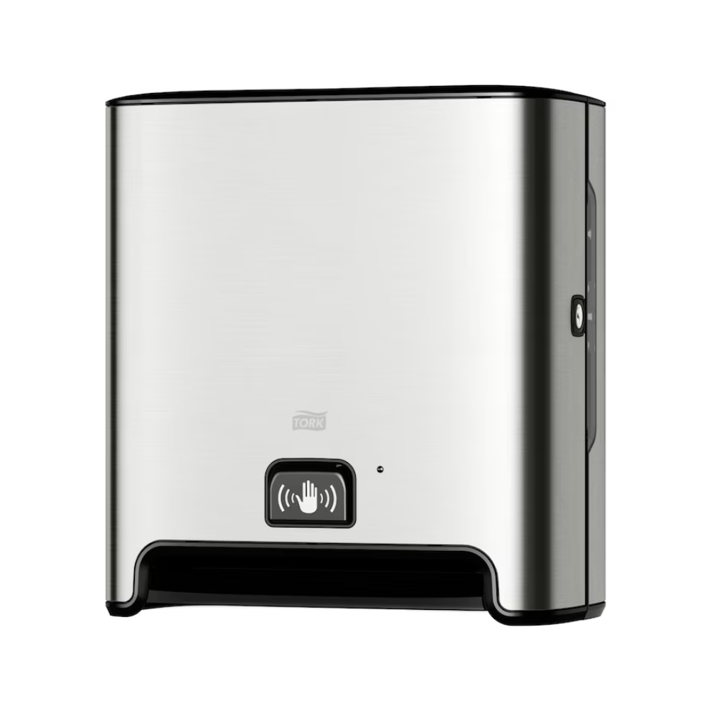 TORK Tork Matic® 460001 senzorový dávkovač na ručníky v roli Image Line z nerezové oceli pro montáž na zeď se senzorem H1 | Balení (1 kus) s černým podstavcem a symbolem senzorového indikátoru na přední straně. Tento dávkovač, navržený pro bezdotykové vydávání jednotlivých listů, má moderní, jednoduchý vzhled a používá ručníky v roli, aby zajistil hygienický zážitek.