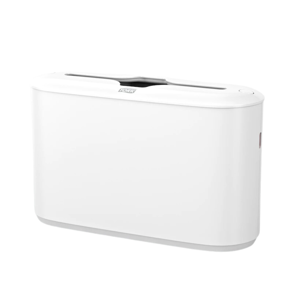 Dieses elegante, rechteckige elektronische Gerät von TORK – Essity Professional Hygiene Germany GmbH, bekannt als Tork Xpress® 552200 Tischspender für Multifold-Handtücher Elevation H2, verfügt über ein elegantes weißes Finish mit Tork Xpress®-Technologie. Es verfügt über einen Schlitz oben und einen Knopf an der Seite und sein minimalistisches Elevation-Design mit glatten Kanten sorgt dafür, dass es jeden modernen Raum elegant ergänzt.