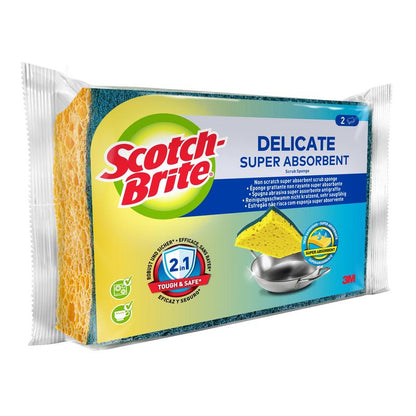 Balení se dvěma Scotch-Brite® Delicate nepoškrabávající přírodní vláknové čisticí houbičky od 3M Deutschland GmbH v modro-zeleném obalu, který zobrazuje žlutou houbičku na čištění kovové mísy - ideální pro citlivé povrchy.