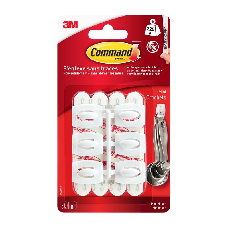 Command™ Mini-Háček, 17006 od 3M Deutschland GmbH obsahuje šest bílých háčků s lepicími proužky pro bezpoškozující, bezvrtací zavěšení. Snadno odstranitelný bez zbytků; dodává se v červeno-bílém balení.