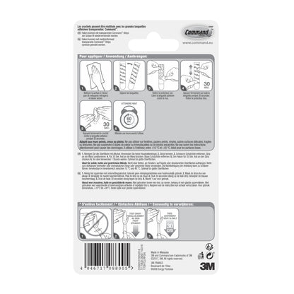 Der Command™ Haken M, mittelgroß, transparent mit transparenten Strips (17091CLR) von 3M Deutschland GmbH hat eine Verpackungsrückseite mit mehrsprachiger bebilderter Anleitung, Warnhinweisen und dem 3M Logo unten rechts.